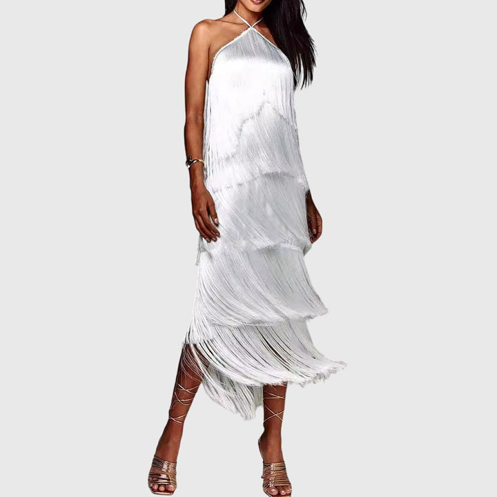 Stunning open-back on a women's elegant tassel halter dress, perfect for special occasion glamour.