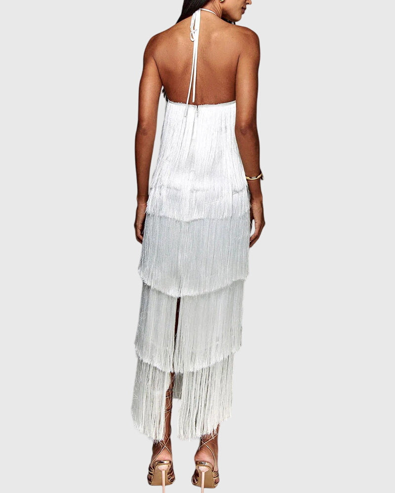 Model wearing a chic women's elegant tassel halter dress. Ideal for evening parties & special occasions.
