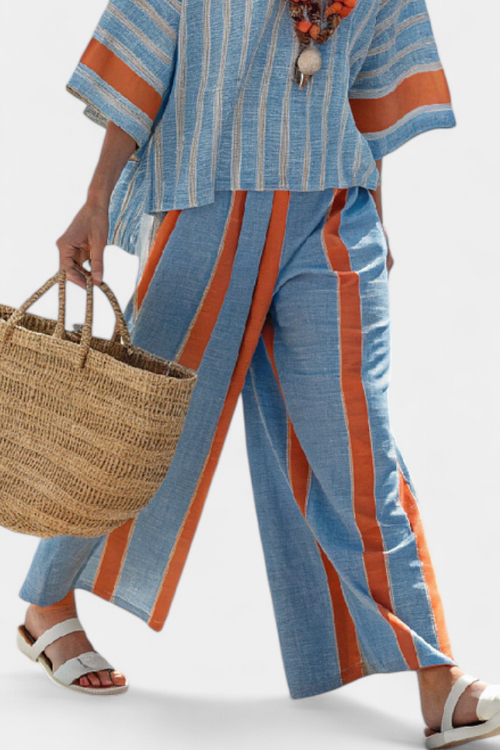 Women's casual terracotta striped top & matching trousers set, a chic and relaxed two-piece outfit for elegant summer style.