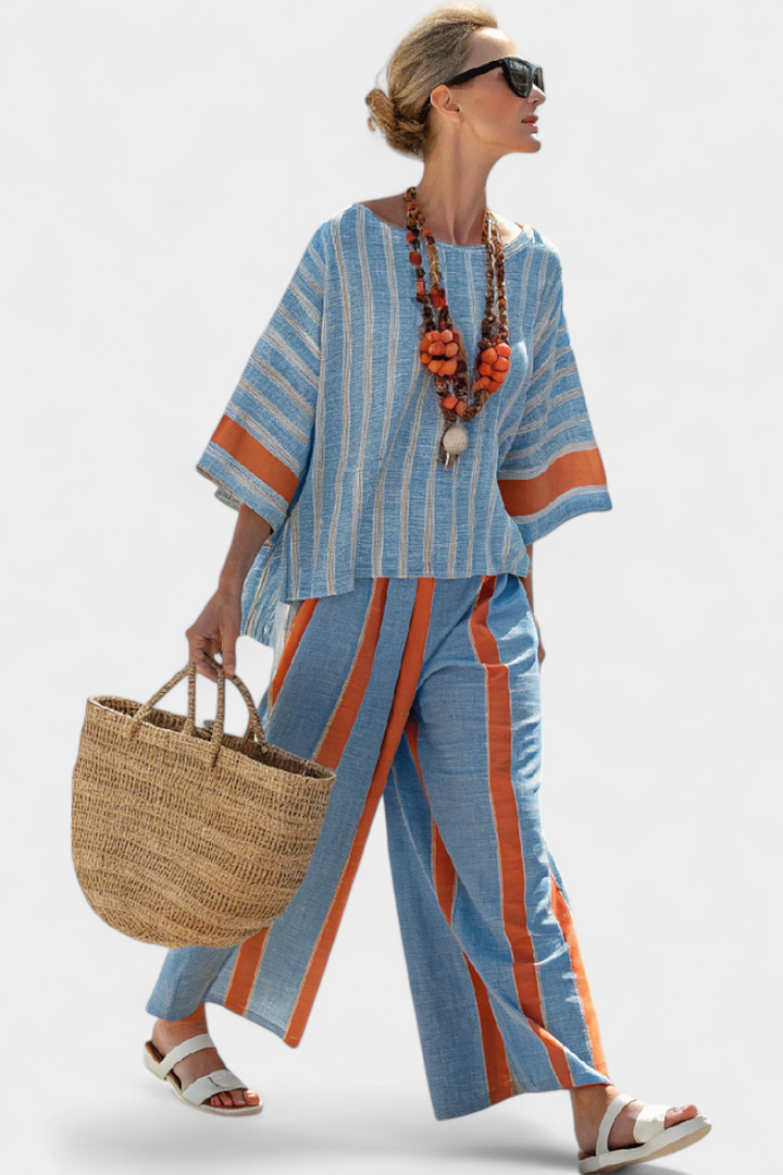 Sophisticated women's terracotta striped two-piece set with a relaxed fit top & trousers for elegant summer casual fashion.