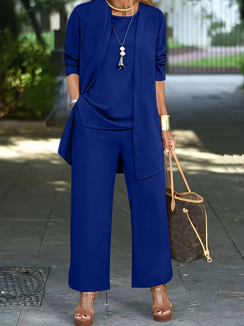 New women's elegant three-piece pantsuit. Features a long sleeve, round neck top, versatile trousers & matching jacket.
