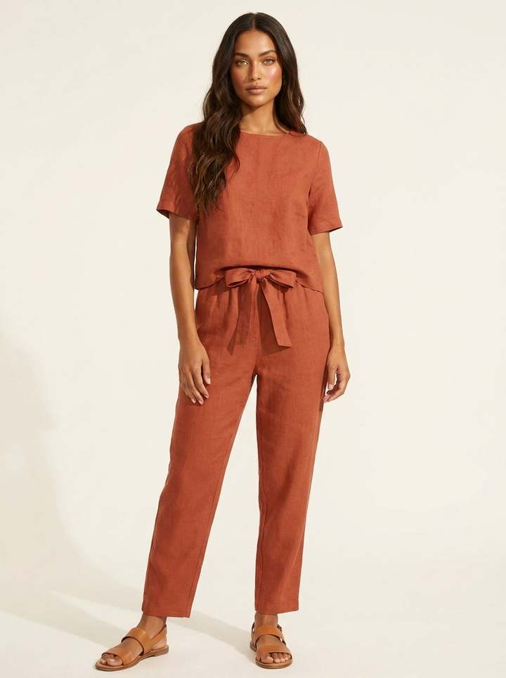 Women's summer fashion tie-waist top and matching wide-leg pants outfit for warm weather.