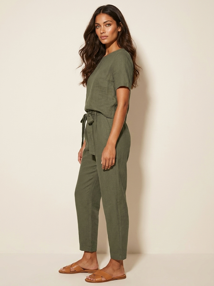 Women's spring/summer two-piece with a chic tie-waist top and relaxed wide-leg pants.