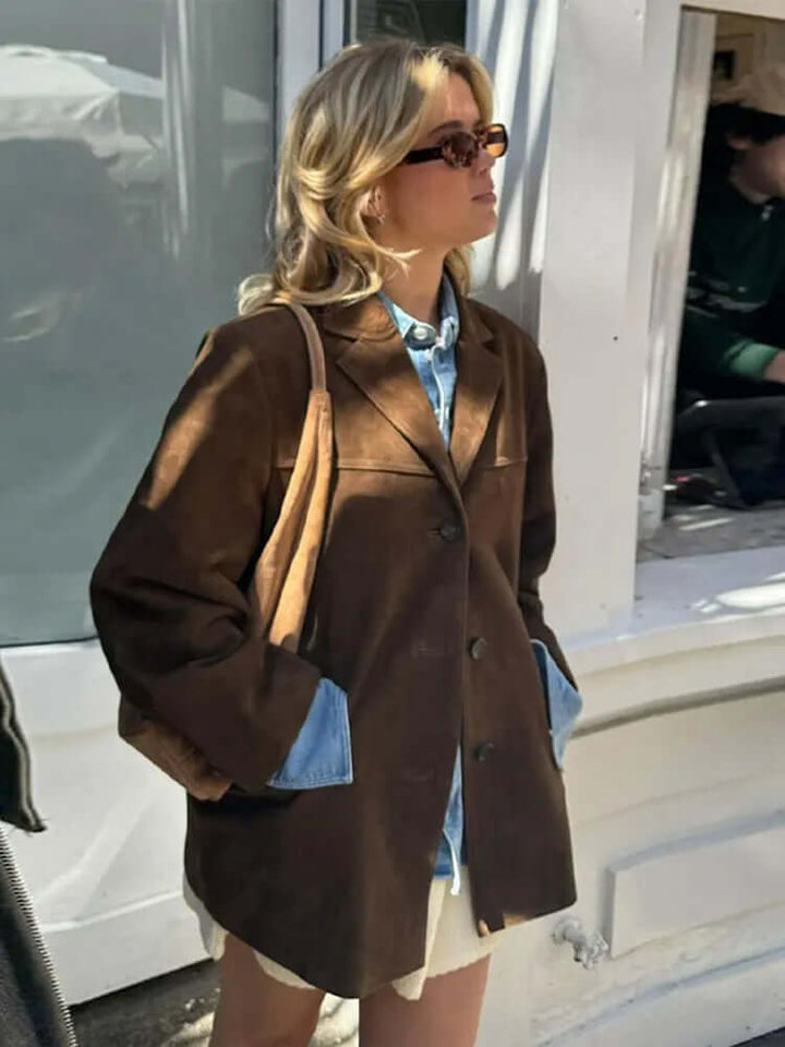 Timeless brown jacket for women. An elegant, classic style essential for chic fashion & versatile outerwear. Sophisticated design.