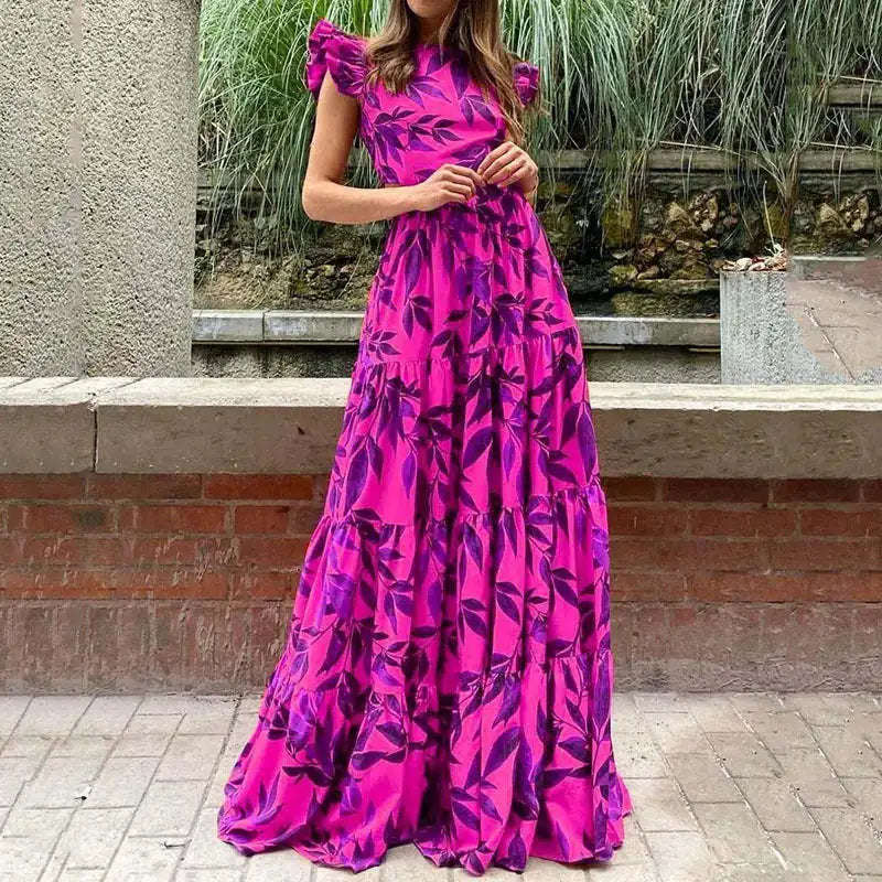 Women's stylish tropical print maxi dress, a chic and comfortable choice for summer vacation beachwear fashion.