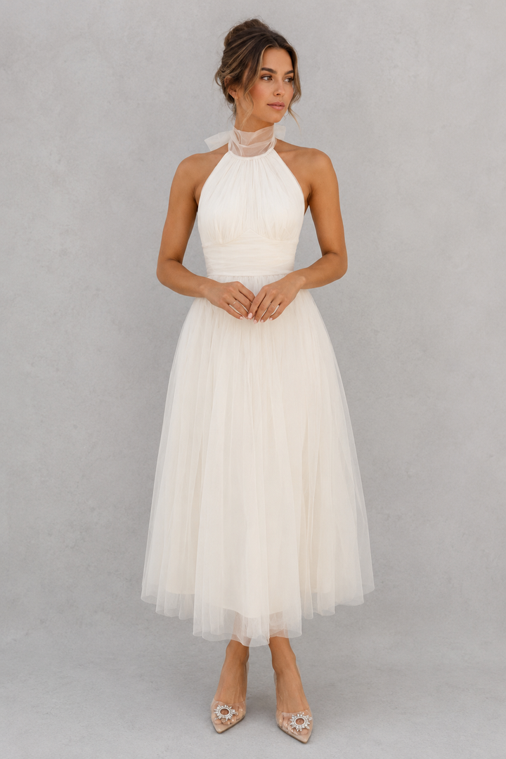 Beautiful women's midi occasion dress, elegant tulle design for special events.