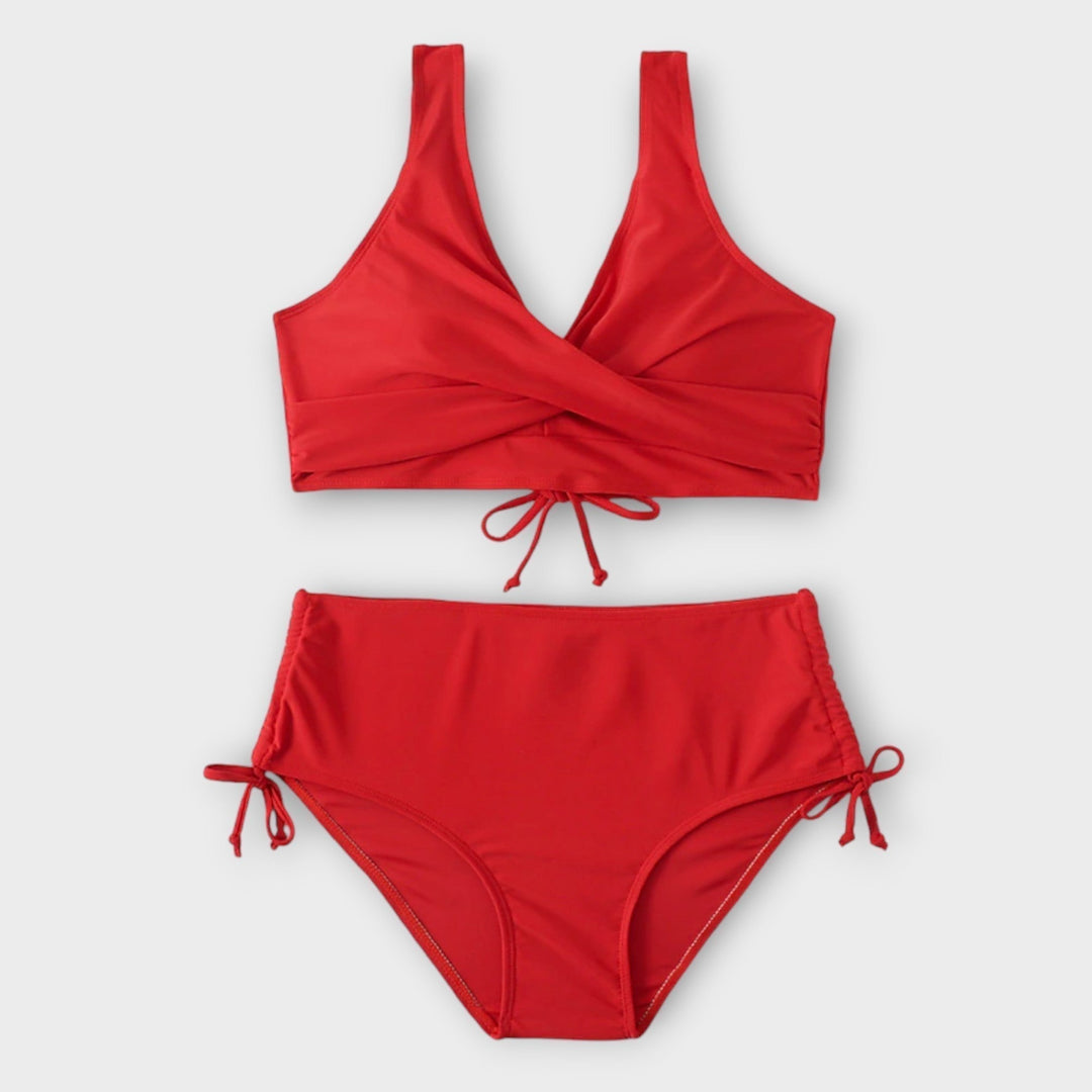 Chic red two-piece bikini, perfect elegant swimwear for women. Flattering design for beach vacations & summer style.