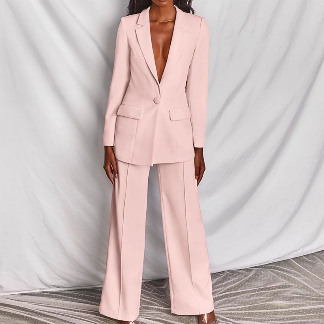 Professional women's matching set: elegant blazer and trousers for a sleek work look.