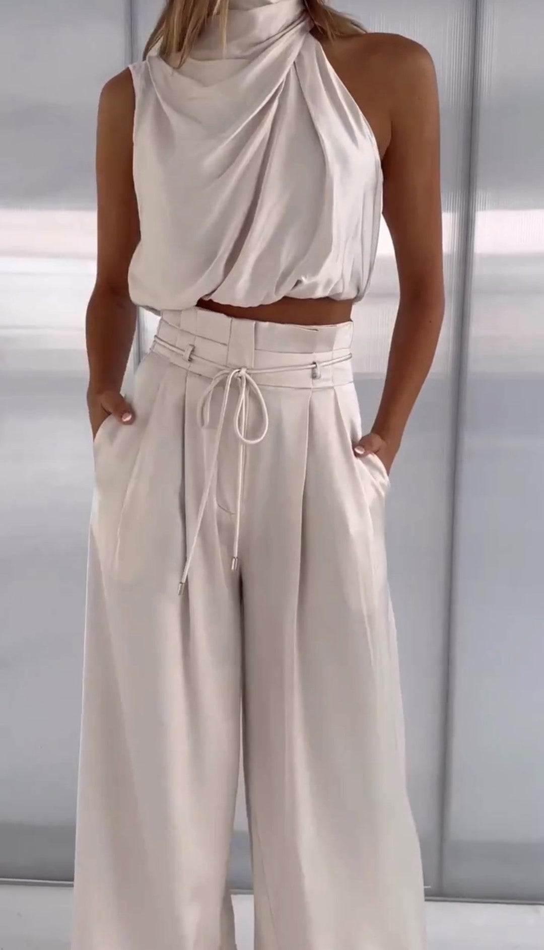 Elegant women's two-piece linen blend set, perfect for spring/summer fashion.