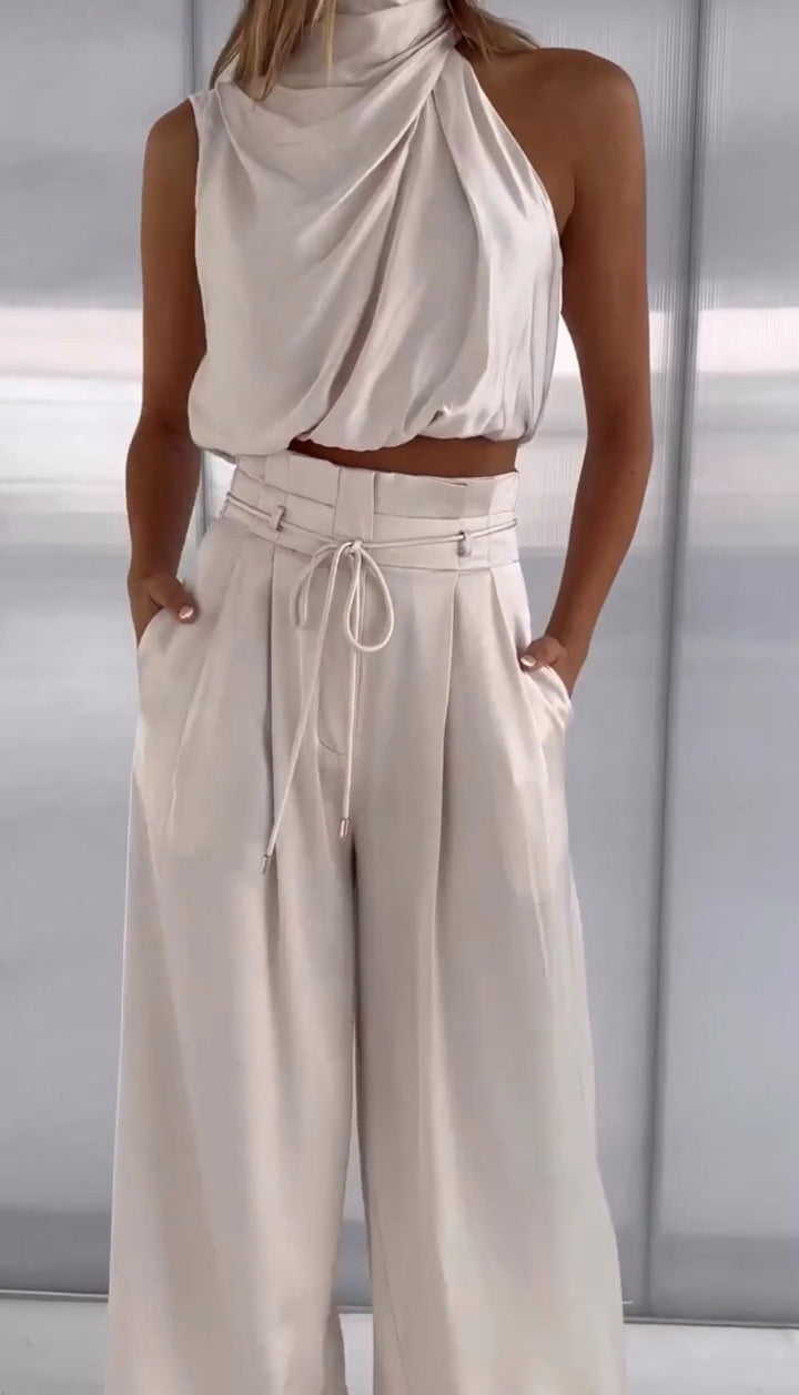 Elegant women's two-piece linen blend set, perfect for spring/summer fashion.