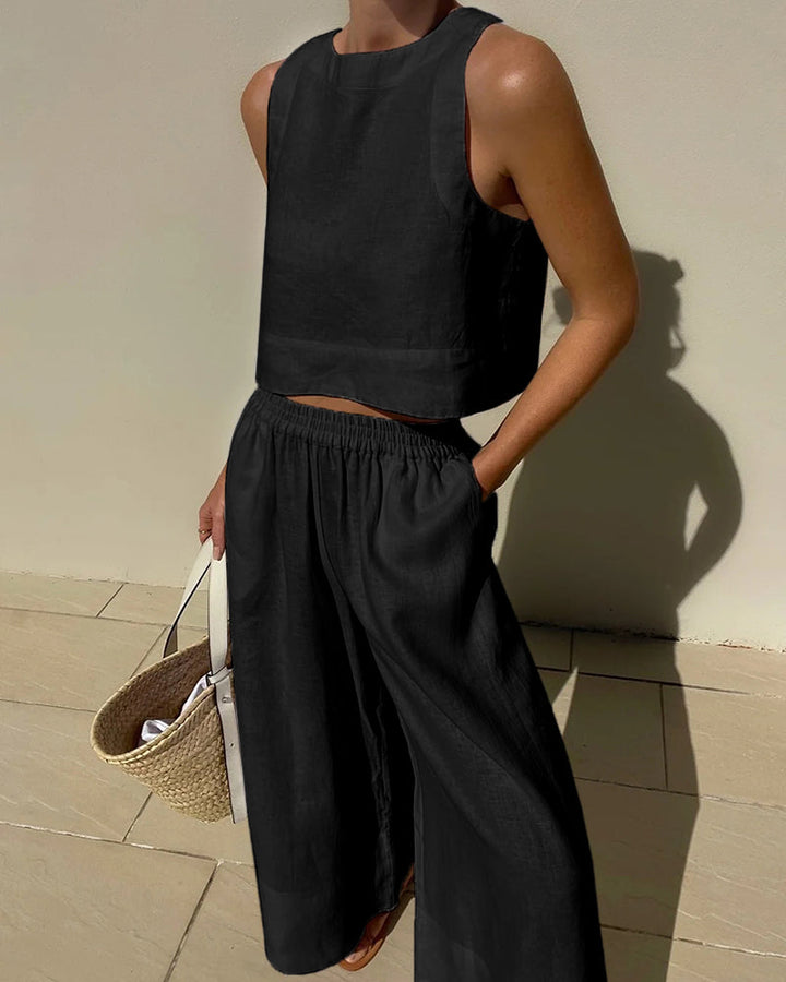 White women's two-piece outfit set. Versatile matching loungewear, elegant for spring and summer fashion.