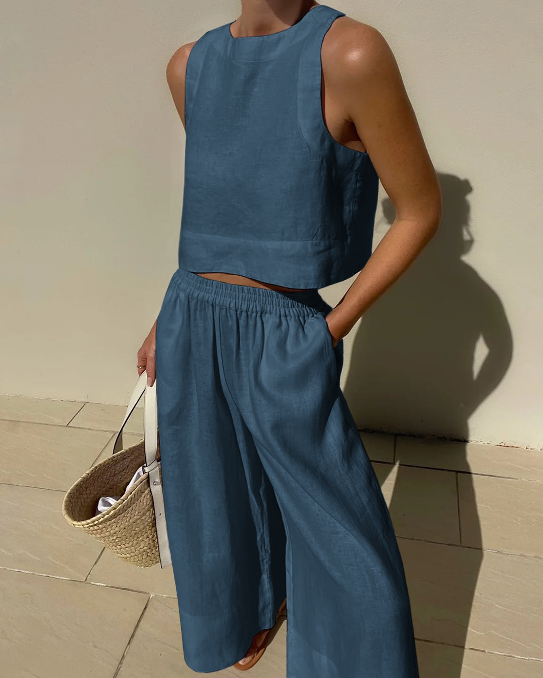 Green women's two-piece casual set. Relaxed fit for spring/summer style, a versatile elegant outfit.