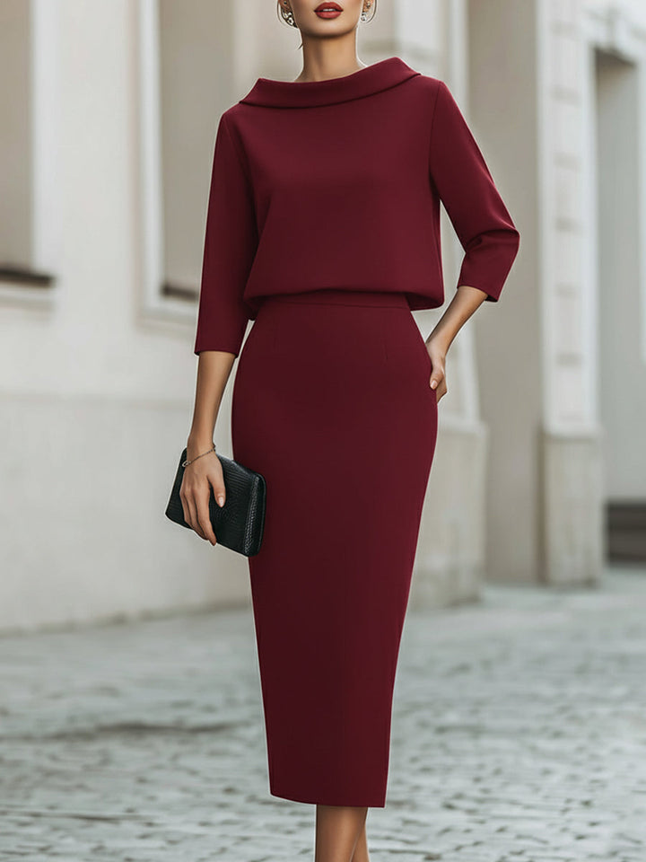 Elegant women's fashion two-piece set: boat-neck top with batwing sleeves & a matching midi skirt.