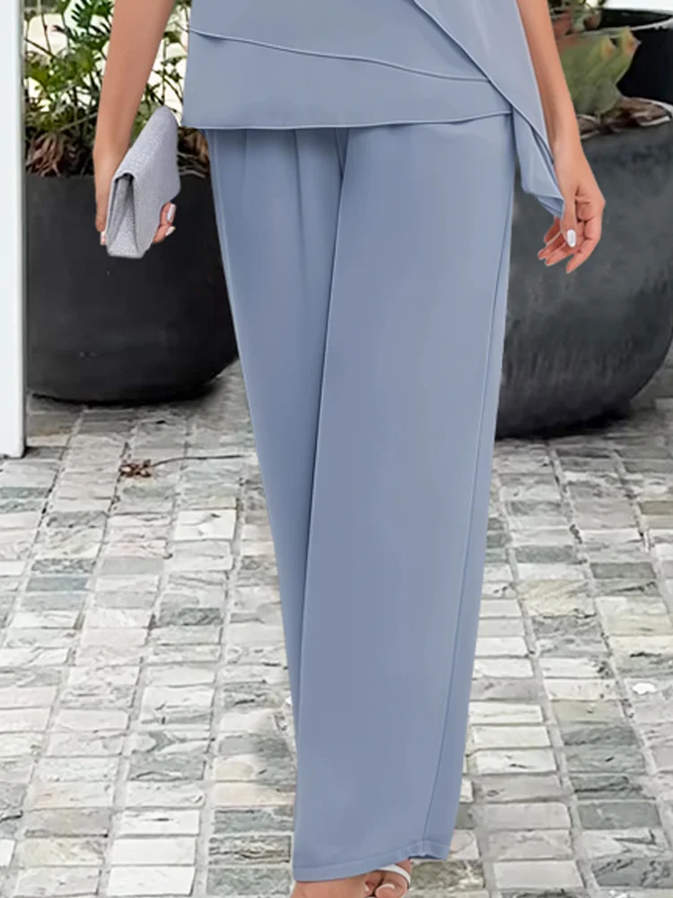 Stylish women's elegant pants set with a chic layered top & sophisticated wide-leg trousers for evening fashion.