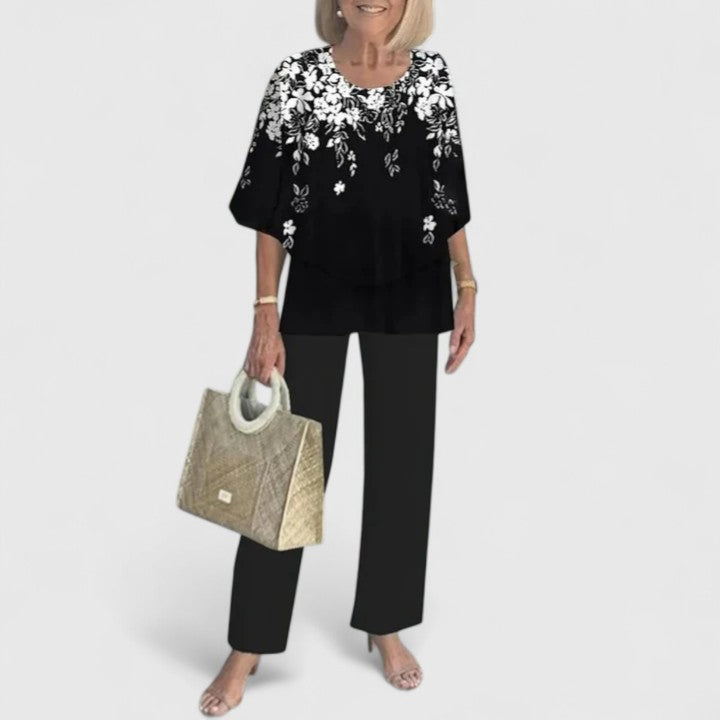 Model wearing versatile women's two-piece set for a relaxed yet sophisticated summer outfit. Comfortable co-ord.