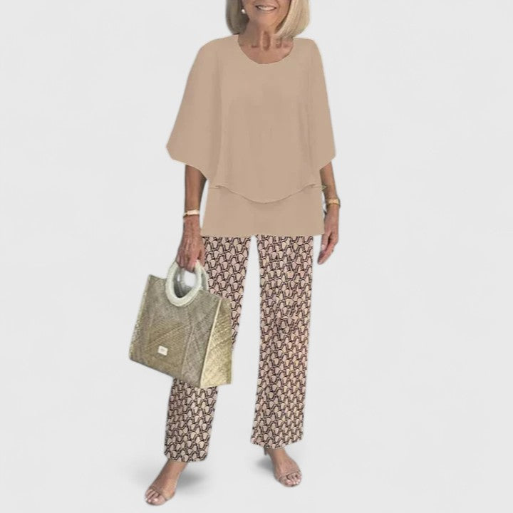Sophisticated women's two-piece set, combining elegant top & comfortable bottoms for versatile summer fashion.