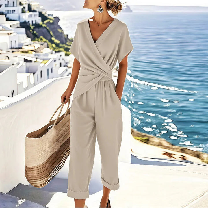 Elegant women's two-piece set with a stylish wrap top and comfortable cropped pants, perfect for summer casual chic.