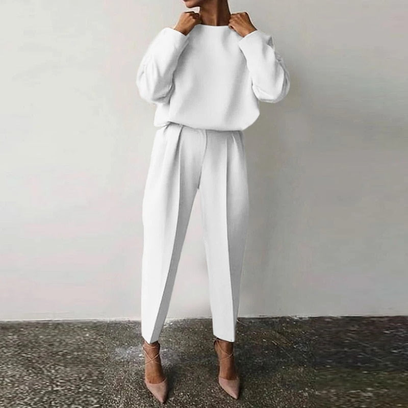 Elegant women's two-piece suit set, perfect for business casual, office attire, or modern smart casual looks.