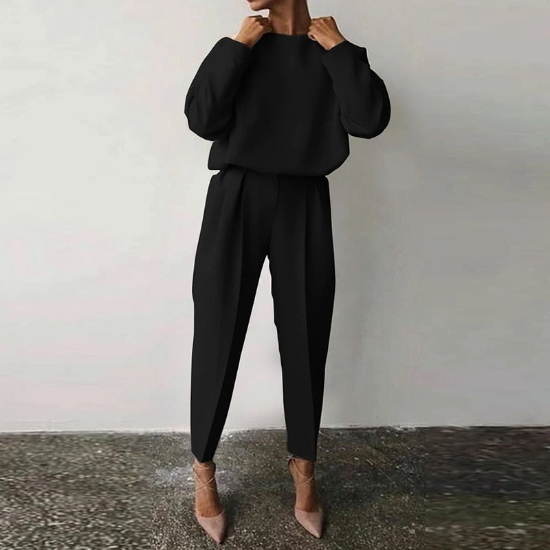 Modern women's elegant two-piece suit set, ideal for business casual, comfortable wear, and stylish office attire.