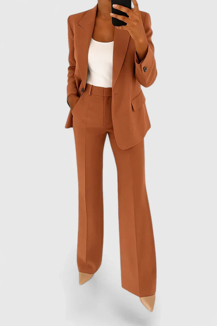Stylish women's suit set, two-piece with elegant jacket & trousers. Perfect professional dress & business attire.