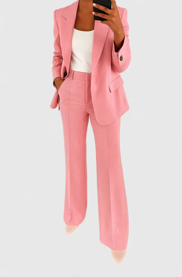 Modern women's two-piece suit set for a sophisticated look. Versatile office, formal, or evening wear fashion.
