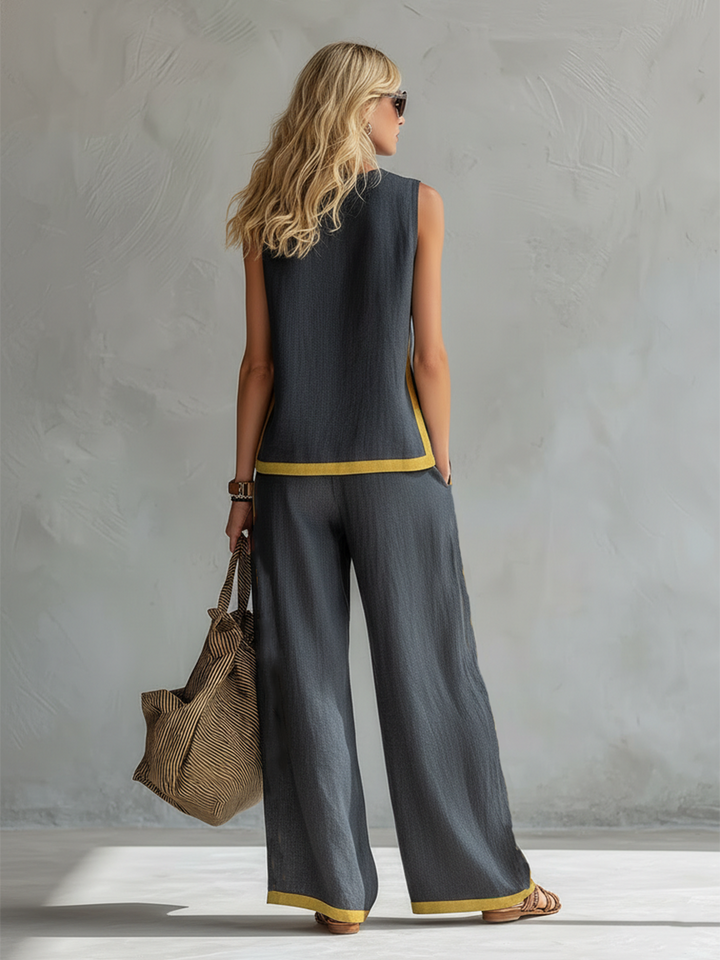 Sophisticated women's suit with a comfortable fit, showcasing modern graphic accents and wide-leg pants.