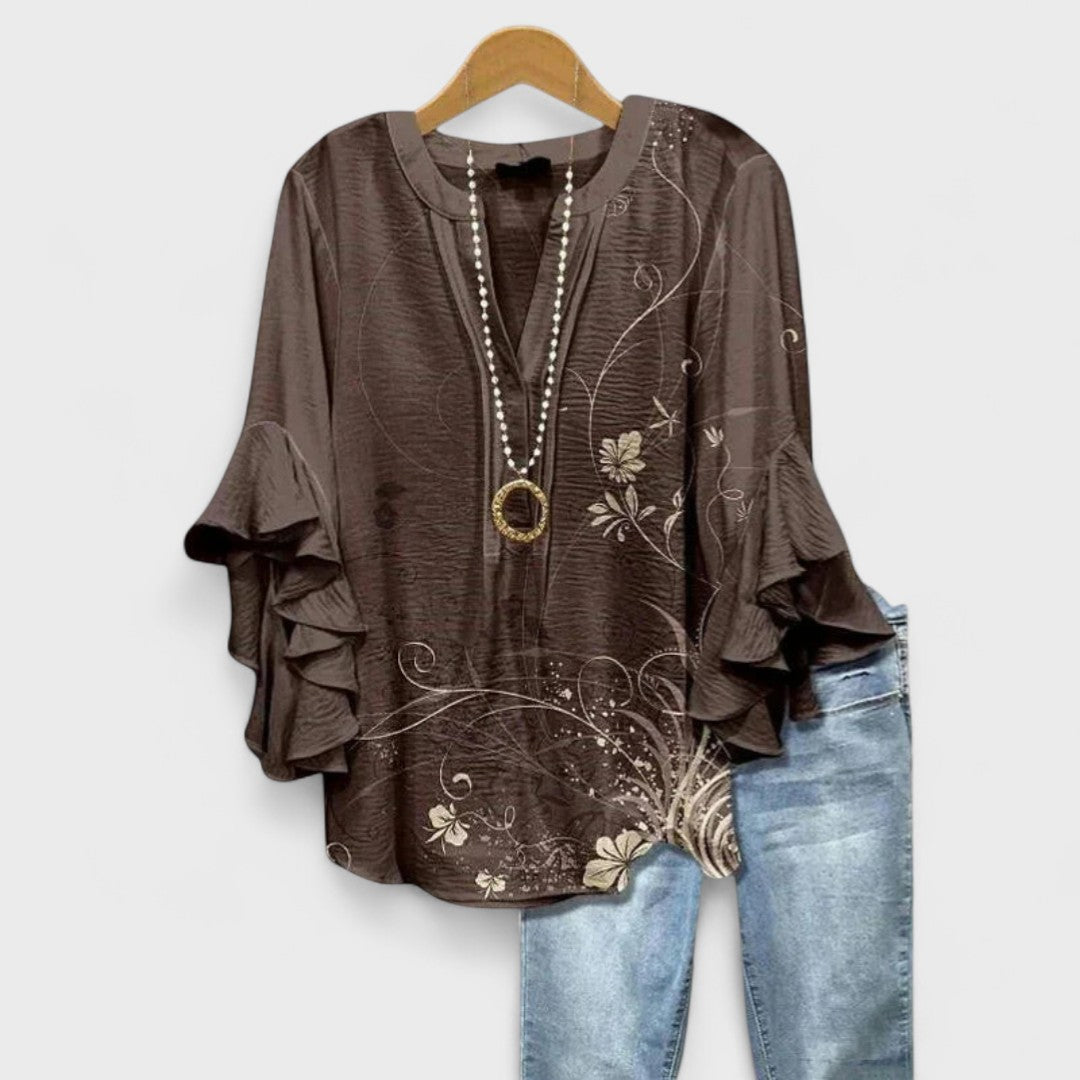 Chic V-neck blouse for women, boasting stylish ruffle sleeves and an elegant design.