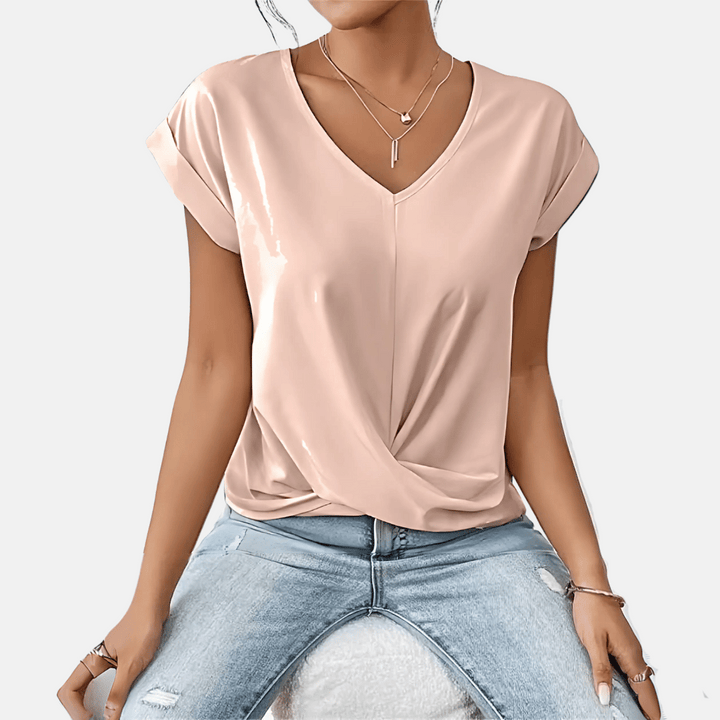 Chic women's casual V-neck blouse with relaxed fit & draped hem. Versatile everyday wear for spring fashion.