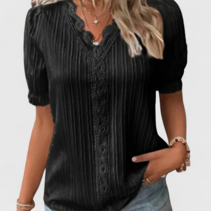 Elegant women's V-neck blouse with unique hollow short sleeves, perfect for stylish summer casual wear.