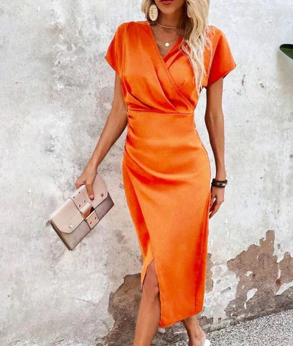Elegant women's V-neck bodycon midi dress with stylish front split, perfect for evening events & parties.