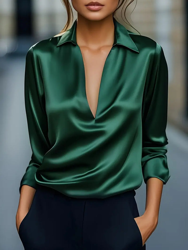 Elegant women's V-neck draped collar blouse for a sophisticated look. Perfect for work or evening wear.