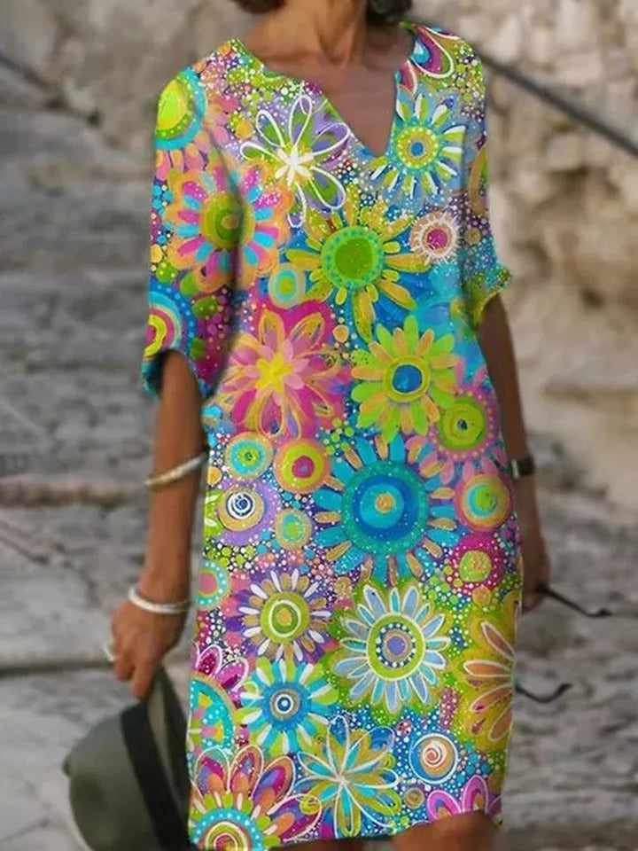 Elegant women's V-neck floral midi dress with short sleeves, perfect for summer & spring style.