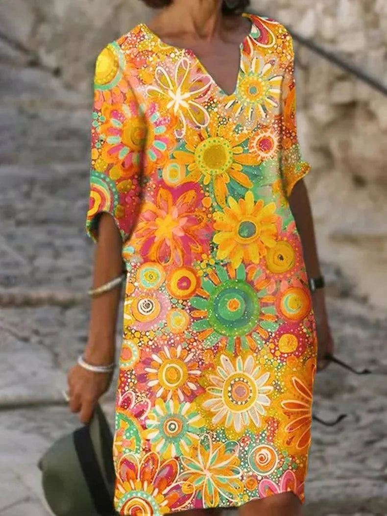 Comfortable & stylish women's floral V-neck midi dress in vibrant yellow, green, pink. Versatile.