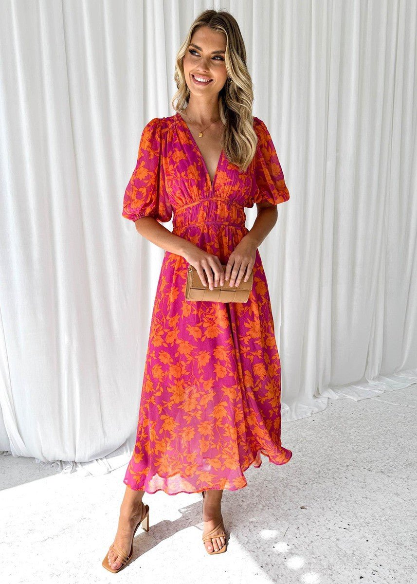 Elegant women's V-neck floral midi dress with stylish puff sleeves, perfect for summer casual or party wear.