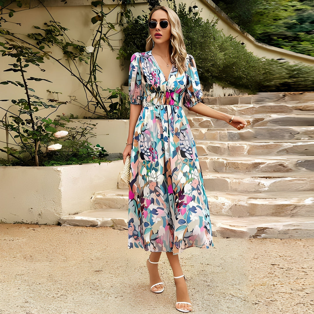 Feminine V-neck flowy maxi dress, an elegant women's summer staple for stylish casual or party wear.