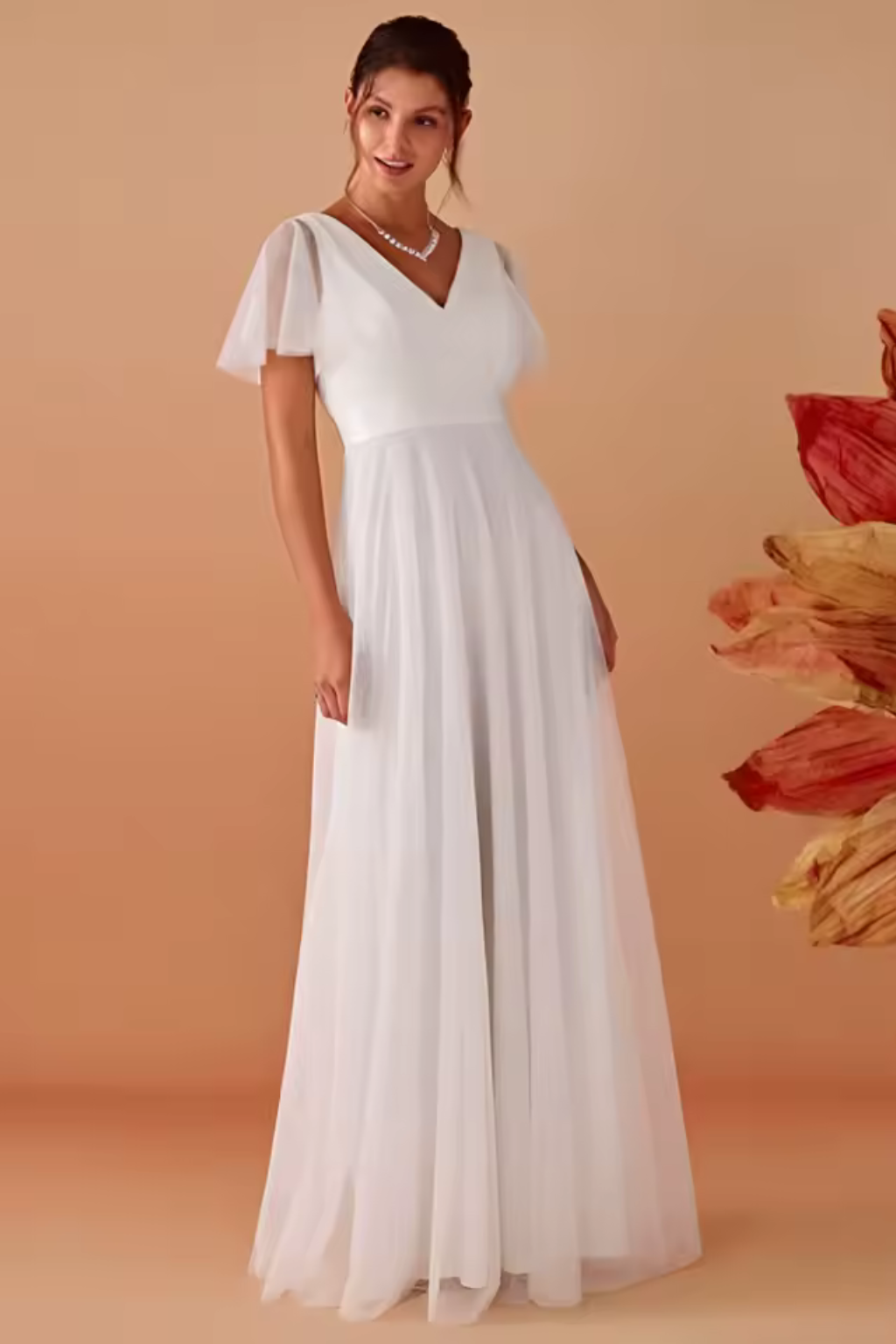 Women's formal maxi dress featuring a stylish V-neck and pretty flutter sleeves, perfect for parties.