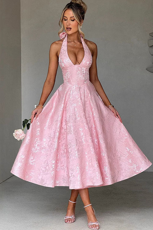 Elegant women's V-neck halter maxi dress with intricate jacquard pattern.