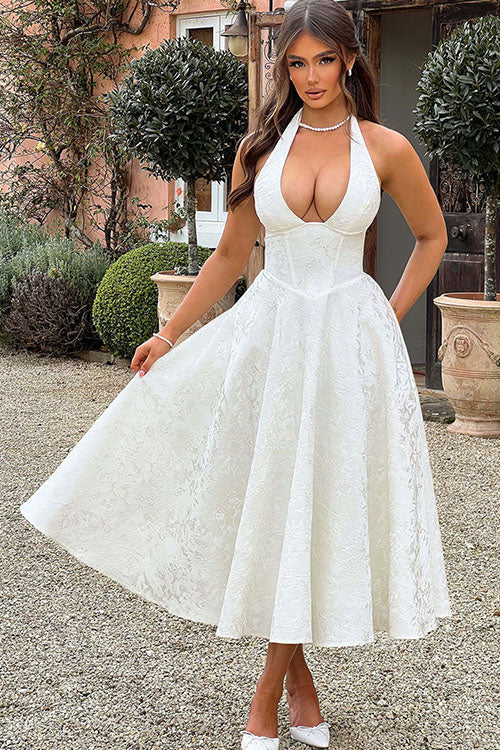 Full-length shot: Women's V-neck halter maxi dress, flowing jacquard skirt.