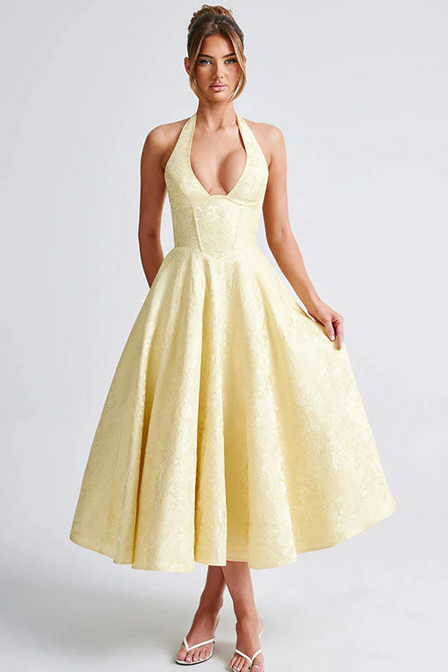 Women's elegant party dress: V-neck halter, jacquard maxi, perfect for dancing.