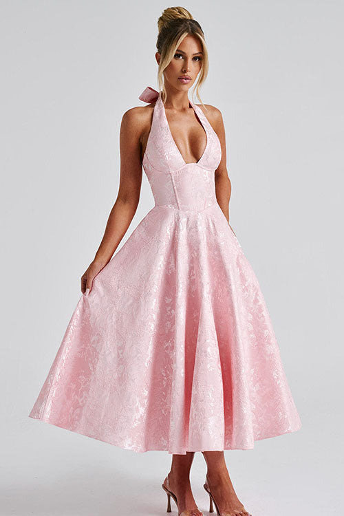 Full view of women's V-neck halter maxi dress, jacquard pattern shimmering.