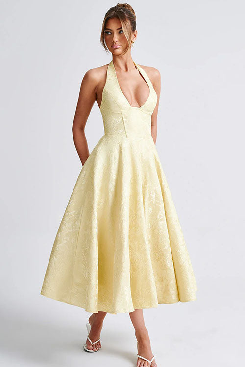Elegant women's evening dress: V-neck halter, flowing jacquard maxi, sleeveless.