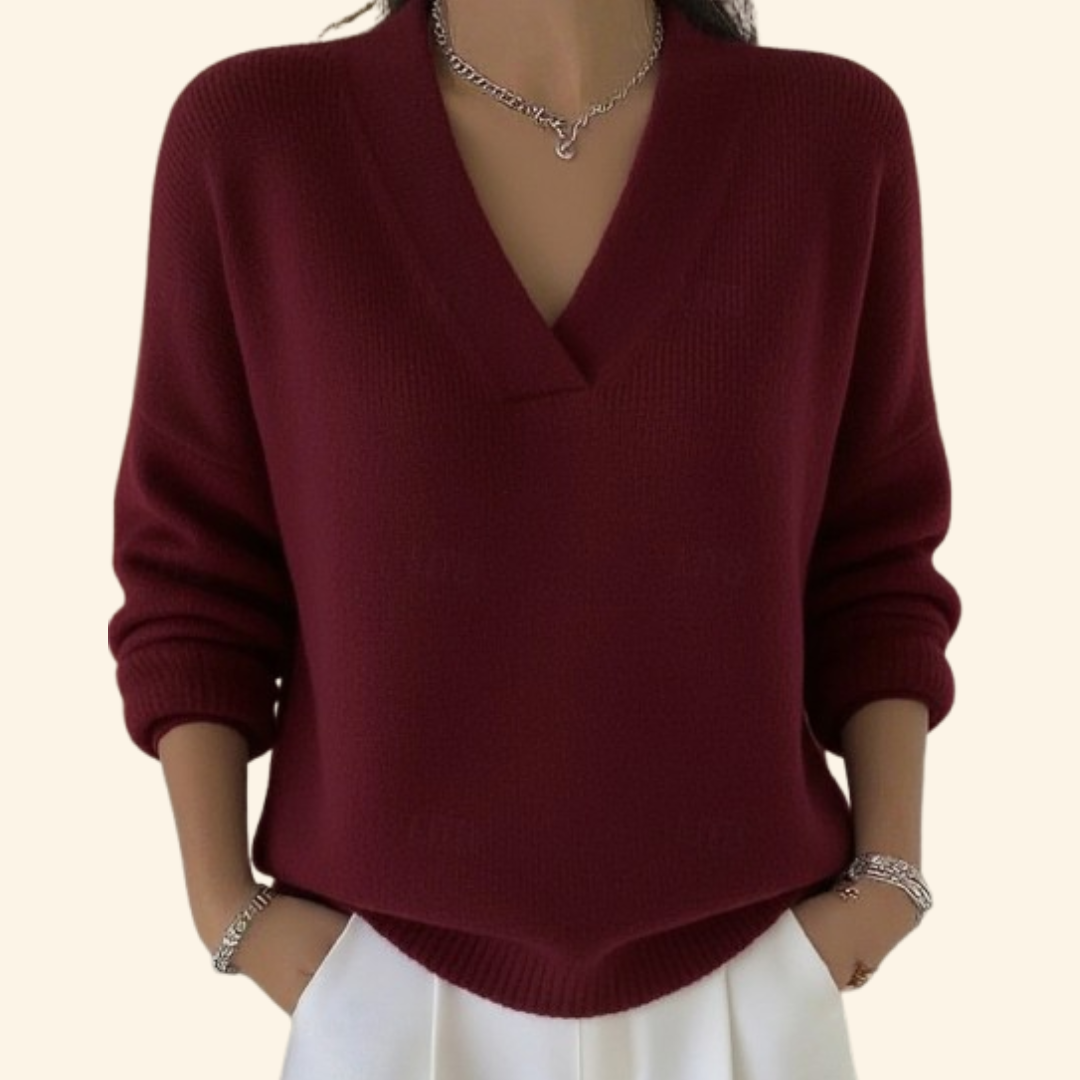 Elegant women's V-neck jumper sweater, perfect for fall/winter, offering cozy comfort & stylish versatility.