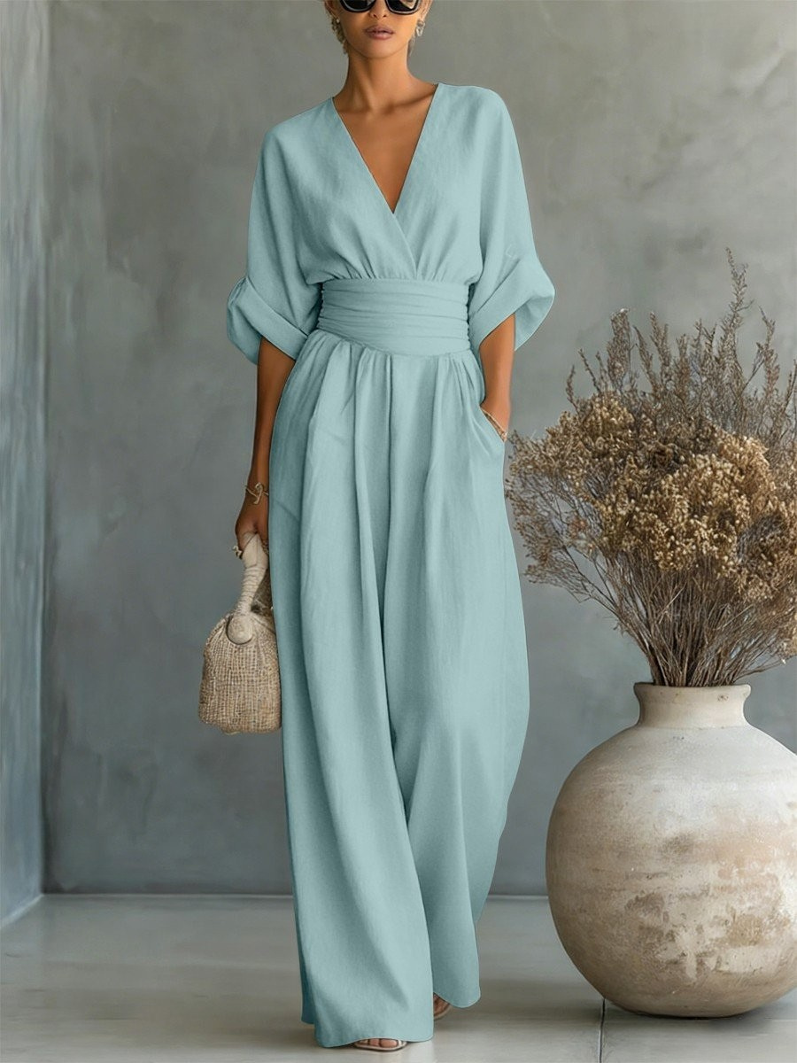 Flattering women's V-neck jumpsuit, a chic and elegant workwear solution and versatile one-piece for weekend outfits.
