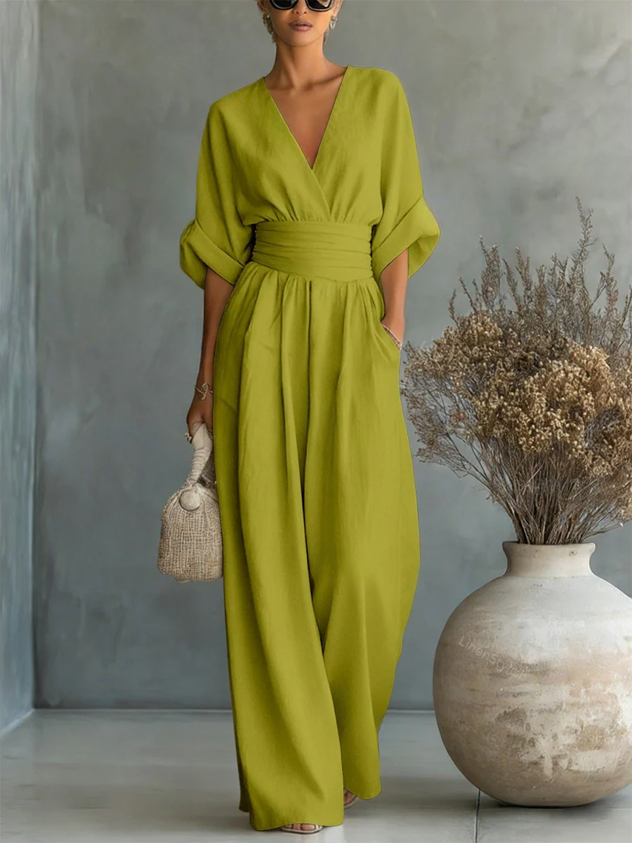 Elegant women's V-neck tailored jumpsuit, suitable for professional work attire and relaxed smart casual weekend outfits.