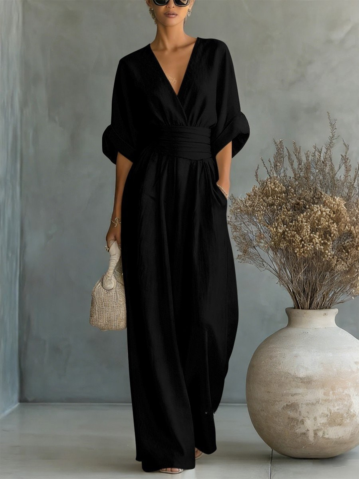 Tailored women's V-neck jumpsuit, an elegant and comfortable one-piece outfit for work and stylish weekend wear.