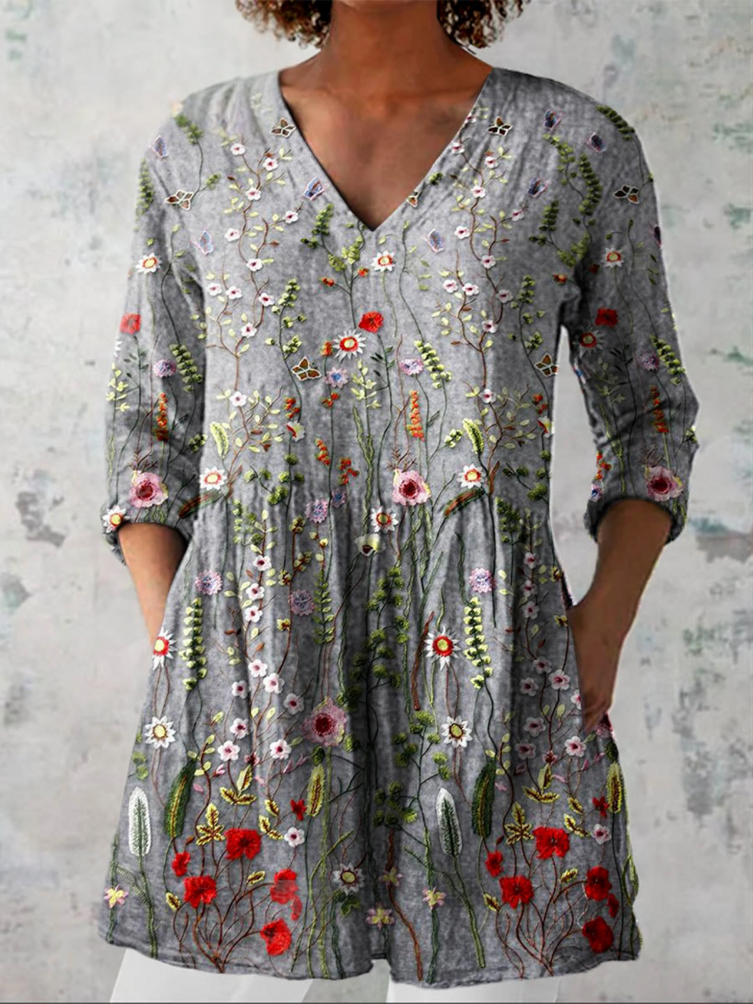 Elegant women's V-neck long blouse for effortless style. Versatile, fluid design offers a comfortable, relaxed fit.