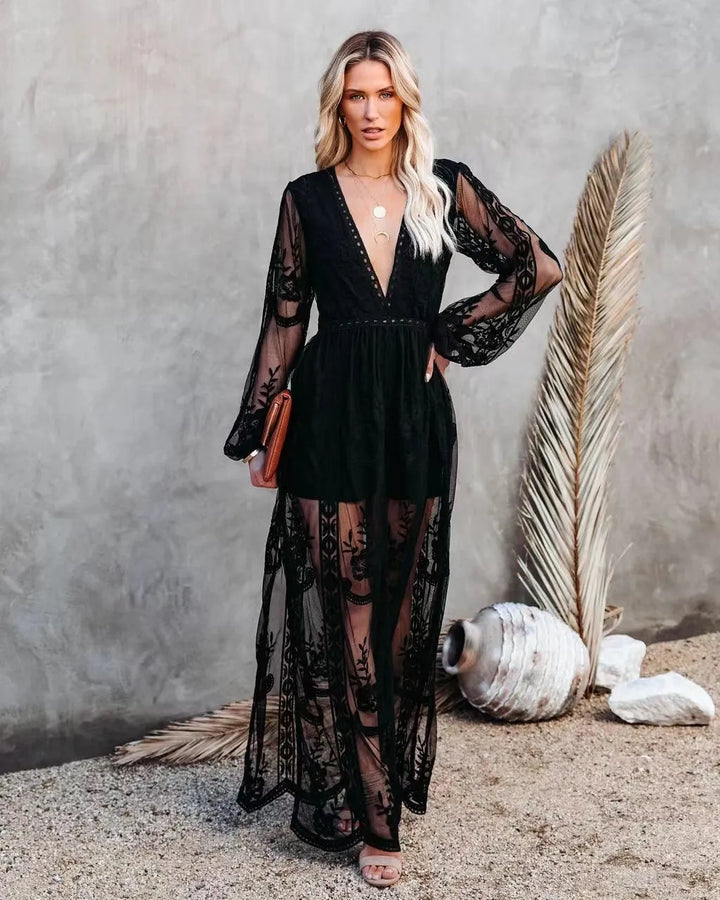 Sophisticated women's long sleeve V-neck formal maxi gown with a high slit, ideal for evening events.