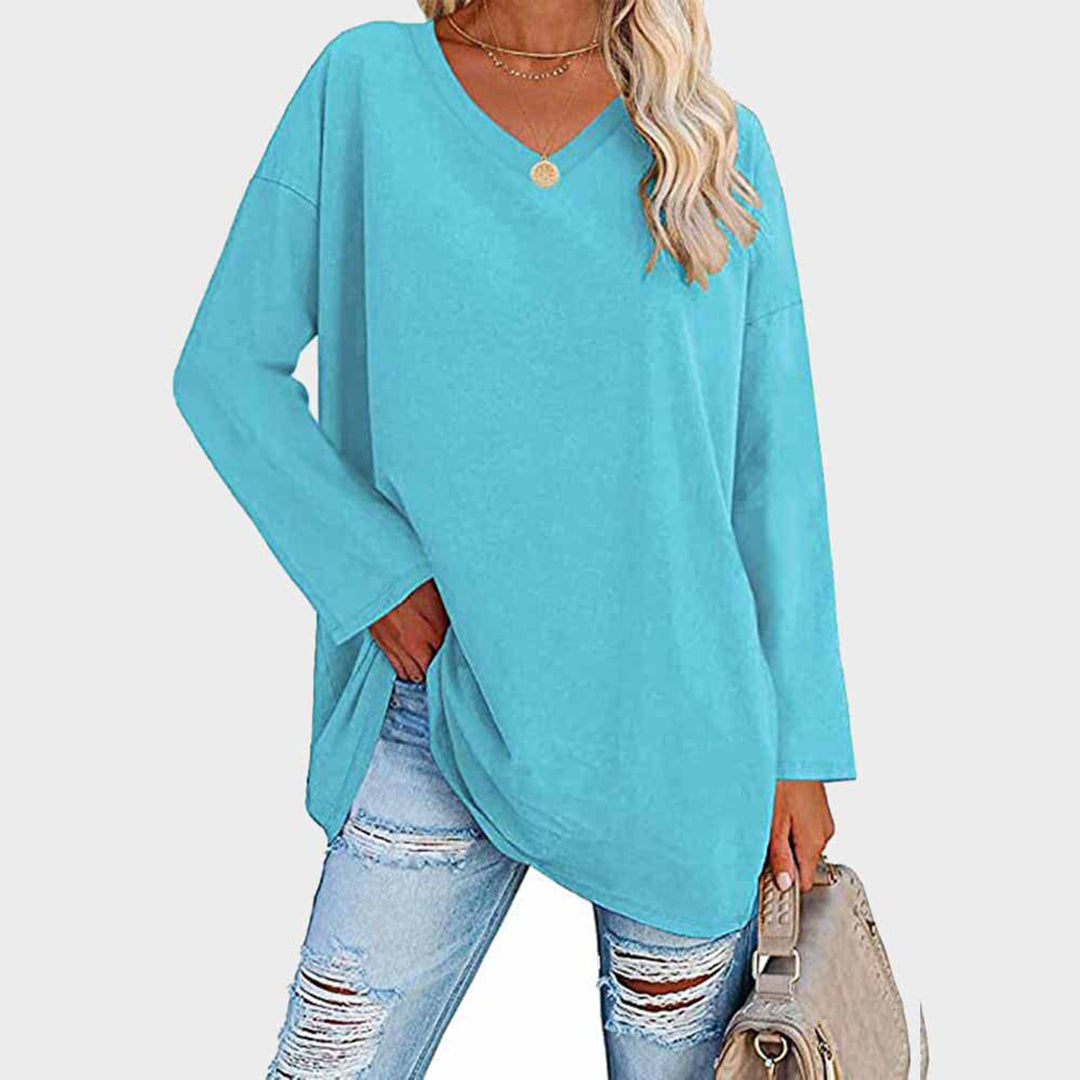 Elegant women's V-neck long sleeve top, perfect for versatile formal or casual wear.