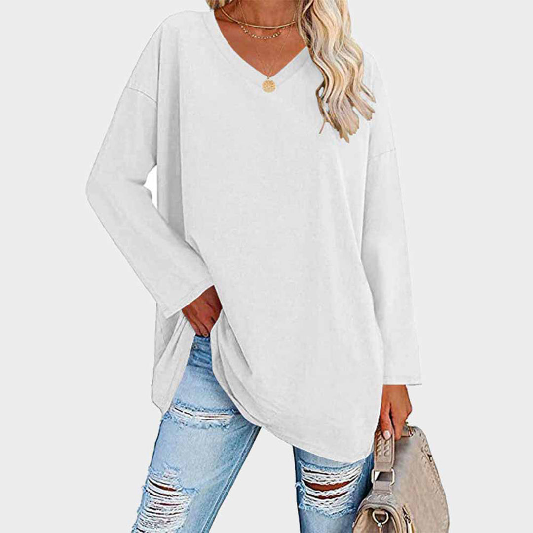 Soft, elegant women's V-neck long sleeve top, providing comfort and a classic, fashionable look.