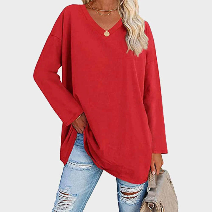 Discover the new elegant women's V-neck long sleeve top, a versatile piece for your wardrobe.
